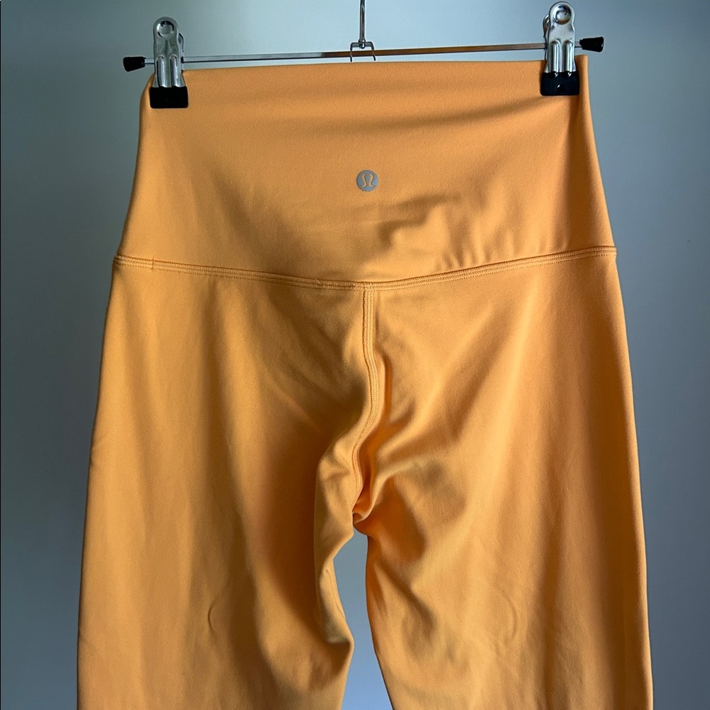 Lululemon align 25 inch leggings. Peach color. Size 4. Never worn!
